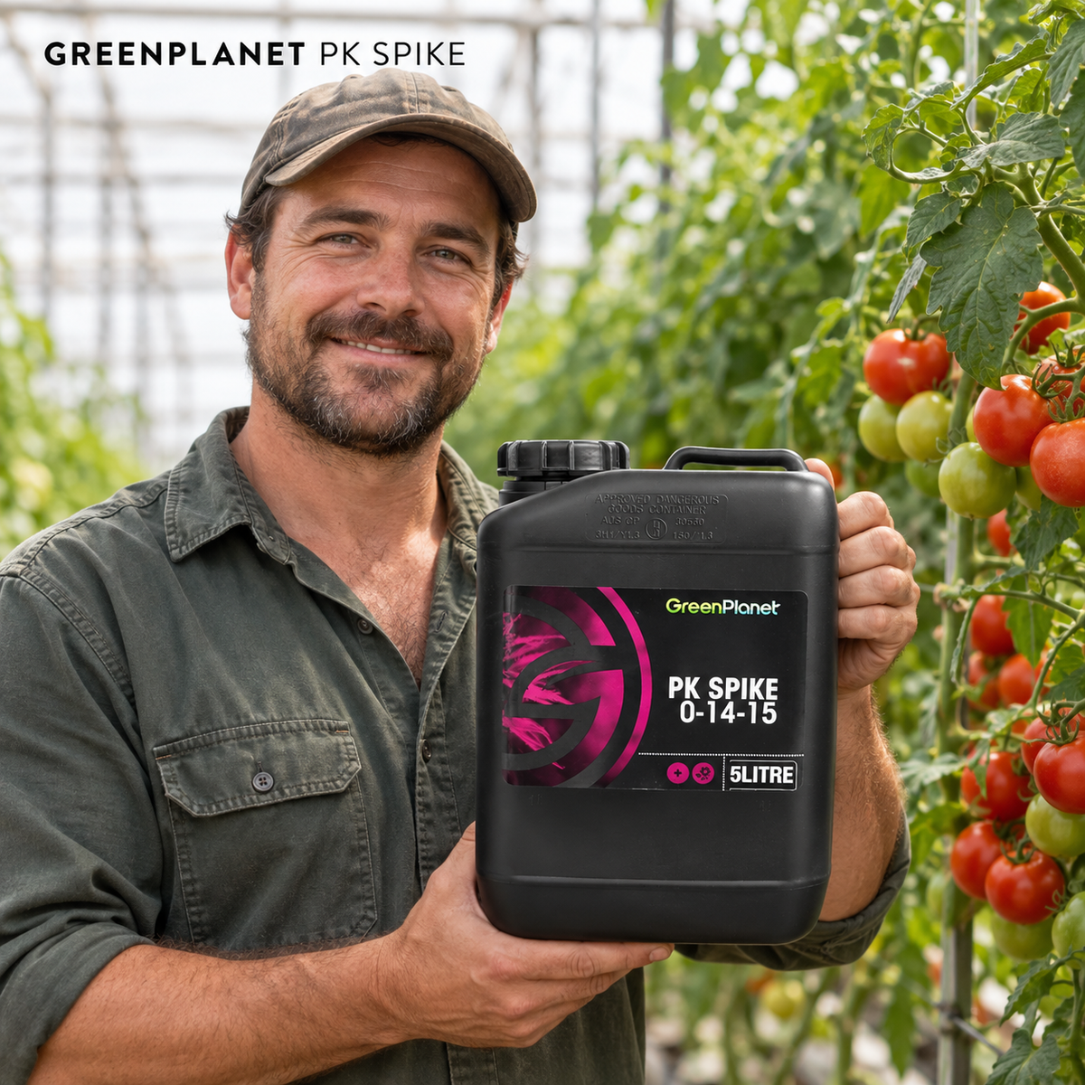 Adult Australian tomato greenhouse grower presenting a closed black 5L jug of GREEN PLANET PK SPIKE.