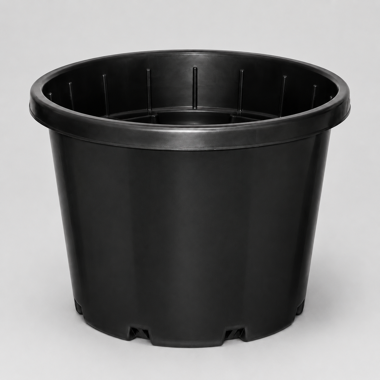 Premium three-quarter render of the empty Pot Slimline Black 330mm - 18L showing the black tapered body, rolled rim and base drainage openings.